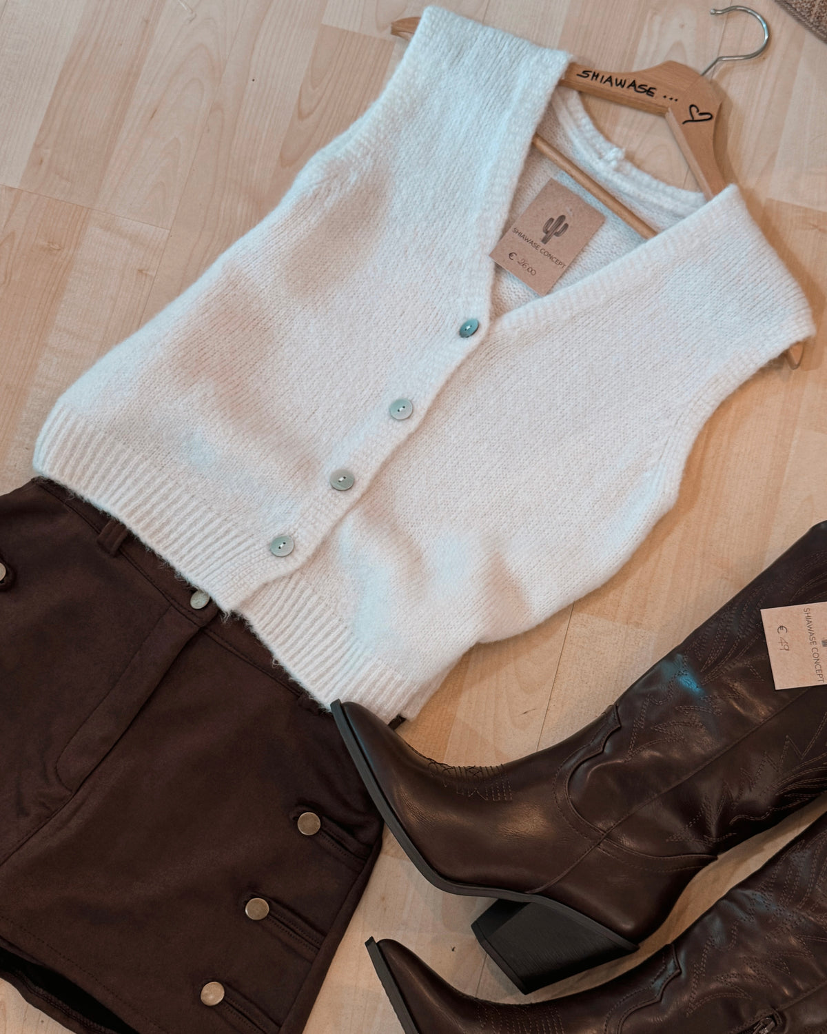 Gilet smanicato panna