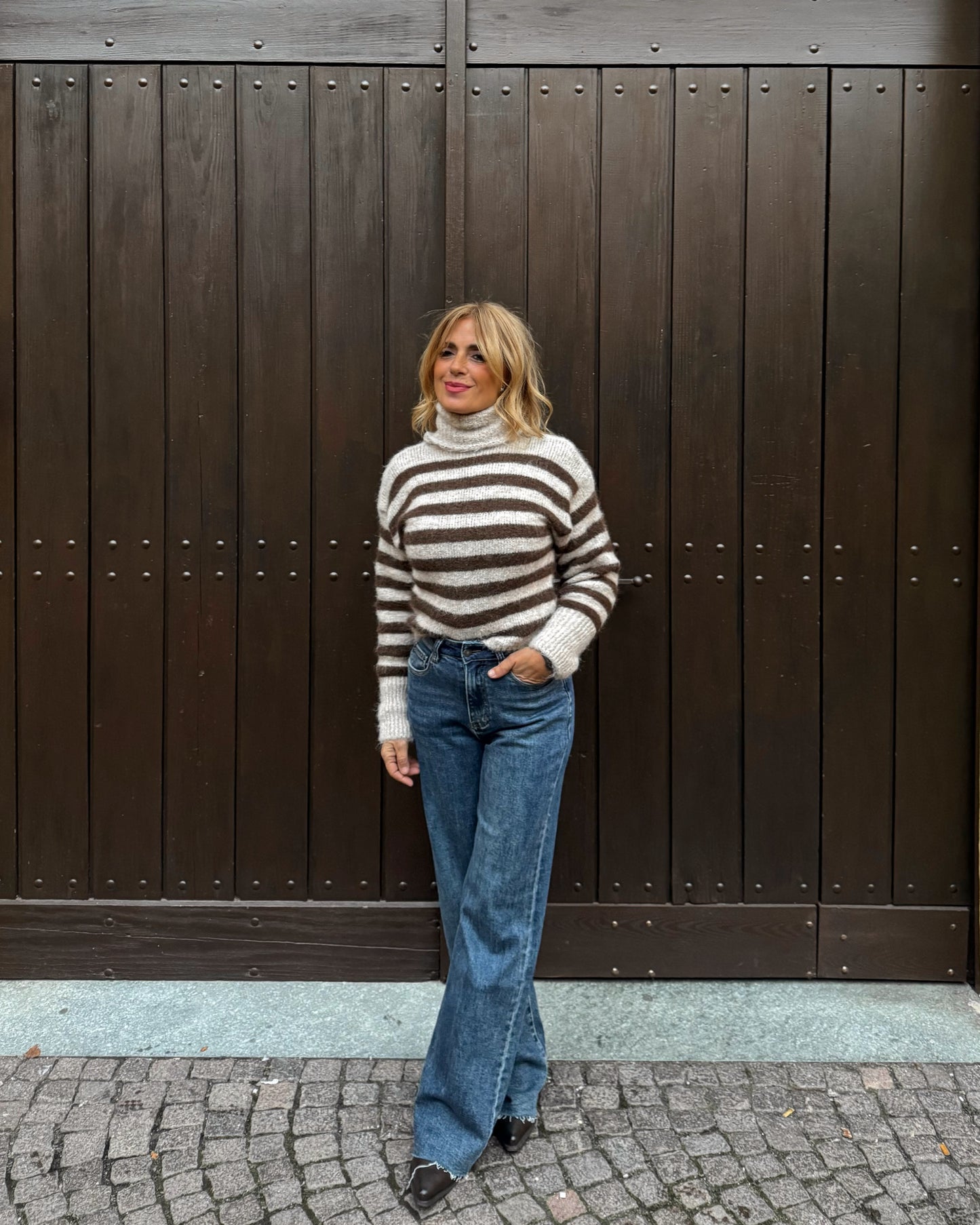 Pull collo alto a righe